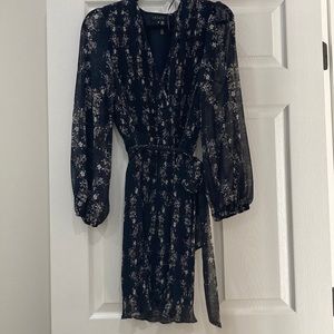 Navy blue dress with pleat detailing